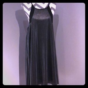 Knee length silvery shimmery dress. Never worn.